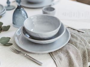 simple gray dinner set consists of plate and two bowls
